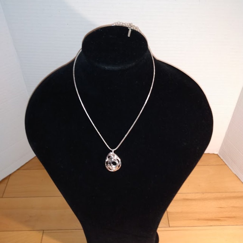 Nine West: Silver Tone Design Look Pendant Necklace.